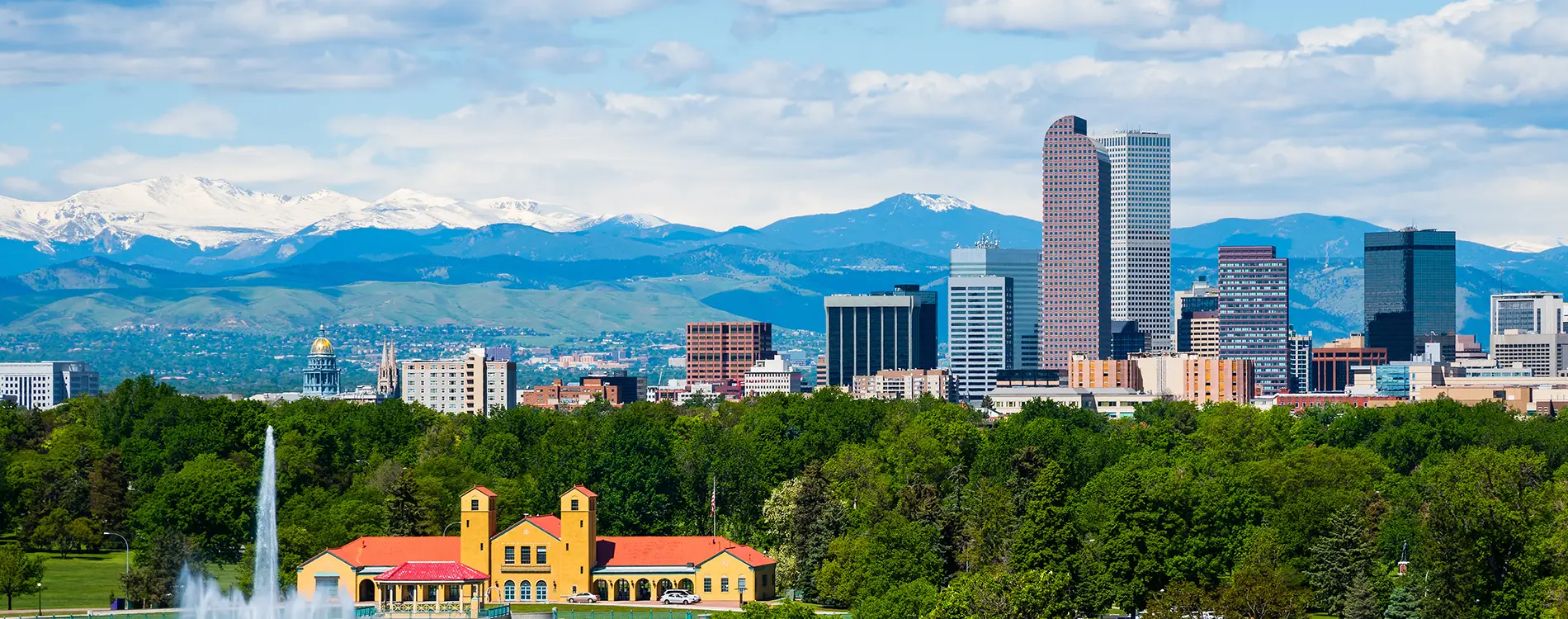 Colorado metal buildings with a view of the Denver skyline