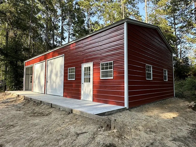 Red metal building installed by a veteran owned metal building company