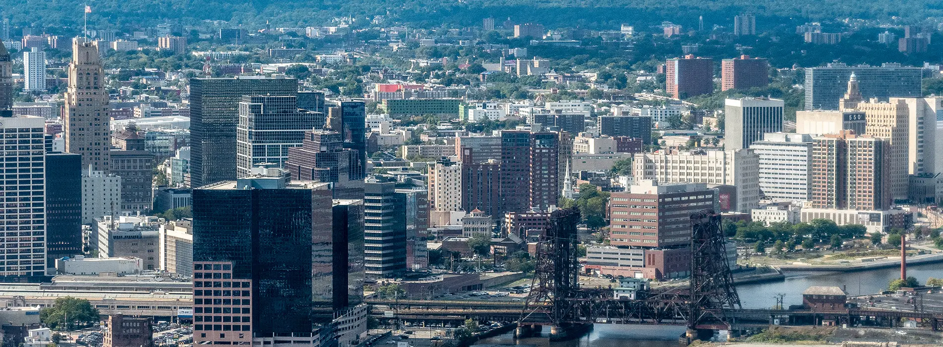 New Jersey metal buildings overlooking a downtown skyline