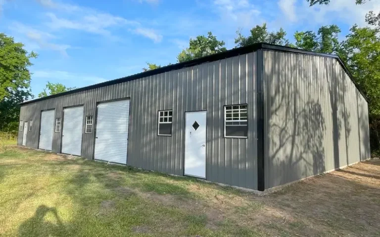 Gray metal garages with workshop-ready bay doors