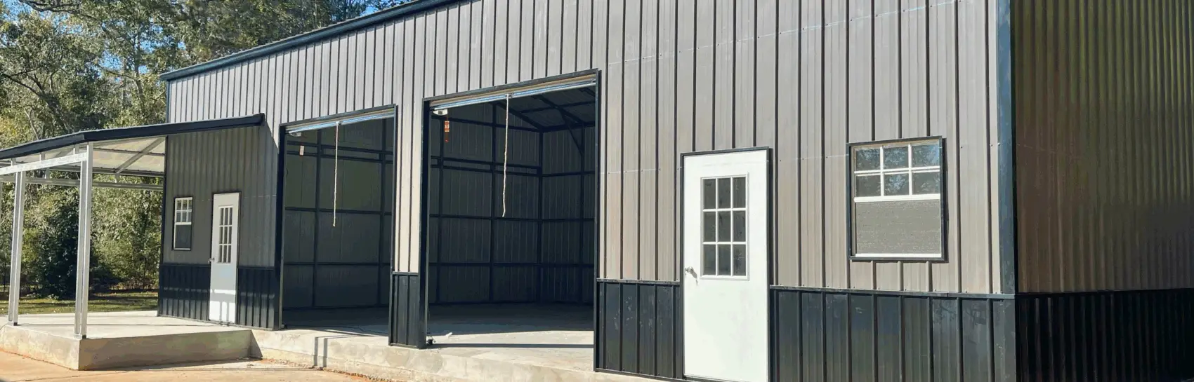 Metal building financing options shown on a large gray metal warehouse